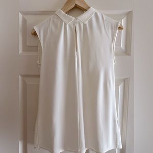 Round-neck collar sleeveless blouse top